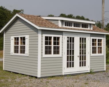 12x16 Custom Storage Shed with french doors, extra windows, and a roof dormer with windows