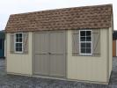 Pine Creek 10x16 HD Dutch Barn with Beige walls, PC Clay trim and PC Clay shutters, and Shakewood shingles